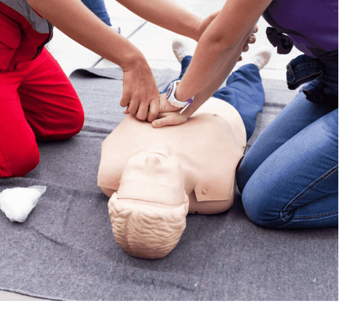 CPR training with mannequin and instructor